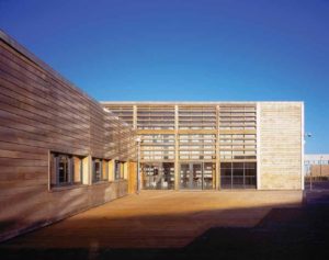 large timber building with horizontal cladding