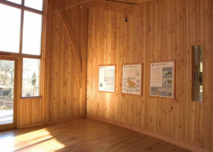 interior timber wall with exhibition graphics