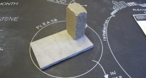 stone blocks on a blackboard table