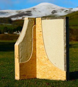 timber panel filled with Jute insulation sitting in a field