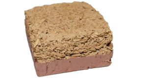 block of cob mixed with clay to create and external building surface material